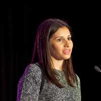 <p>City Council member Eloisa Melendez of Norwalk speaks to the crowd.</p>