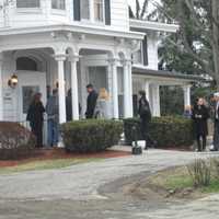 <p>Mourners proceed into the funeral home for the wake of Lacey Carr. </p>