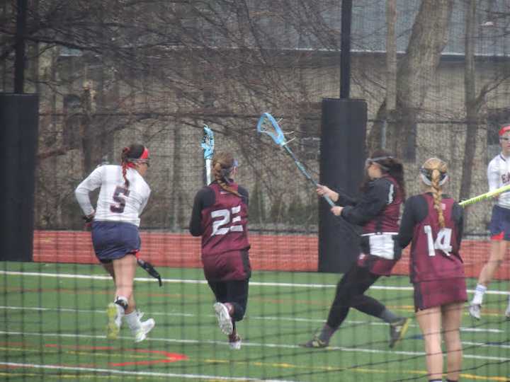 The Eastchester High School girls lacrosse team beat rival Harrison High School in a 12-3 win Tuesday.