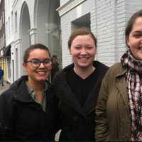 <p>Julia Vos, 23, at right will have to wait until June for her new Apple Watch due to huge sales of the  watch. Joining her </p>