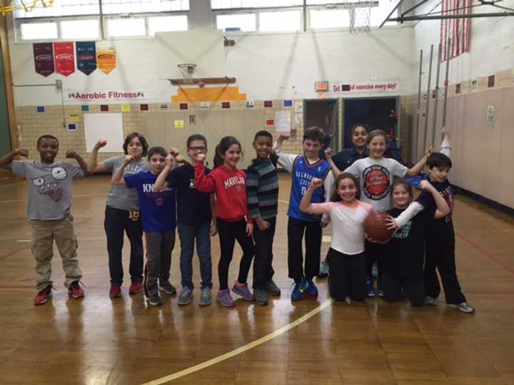 Club Claremont, Claremont Elementary&#x27;s after-school program, includes basketball with Mr. Marino.