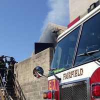 <p>Fairfield firefighters conduct an exercise Monday at the Joseph Elias Training Fire Training Center. </p>