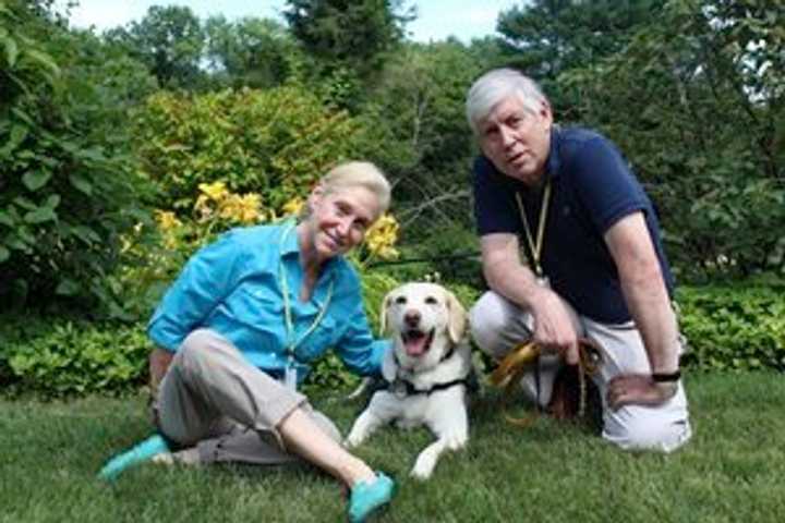 Jane Paley and Larry Price of Easton visit Silver Hill Hospital in New Canaan with their dog, Hooper.