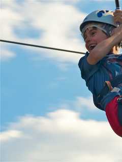 Zip-Line Through Hackensack To Salsa Music At Street Festival