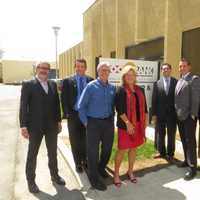 <p>Ellen Lynch, president of the Food Bank For Westchester, and Michael Murphy of Murphy Brothers Contractnig with other energy and insurance experts during a break from a continuing education course in Elmsford on Earth Day.</p>