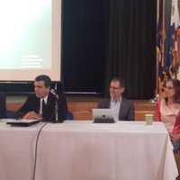 <p>Pound Ridge Police Chief Dave Ryan, second from left, details deer hunting in his town during a panel discussion.</p>