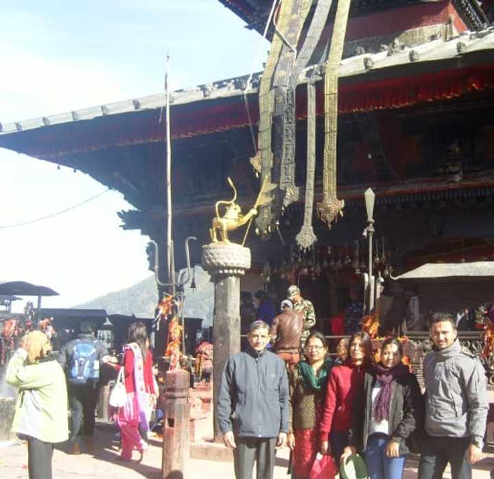 Amit  Adhikari, of Nepal, at bottom right, with his family in front of a Hindu temple in Gorkha, Nepal, called Manakamana, which was badly damaged in Saturday&#x27;s earthquake. He is a student at the University of Bridgeport.