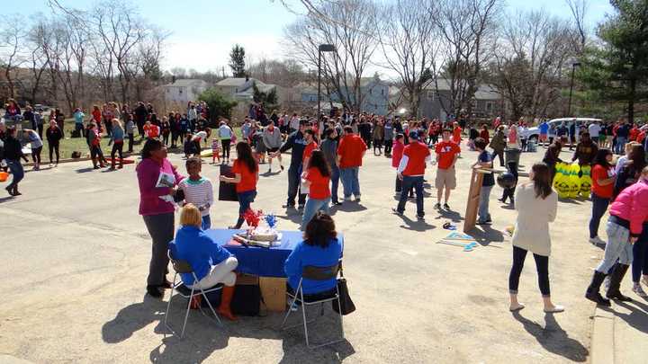 Crowds turn out for the annual Community Day run by students at Sacred Heart University at the North Branch Library and Community Center in Bridgeport. 