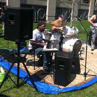 <p>The WSE band of drummer, Frank Shea, keyboardist-vocalist Yotisse Williams and bassist Peter Everett perform at the Sidewalk Art Festival.</p>