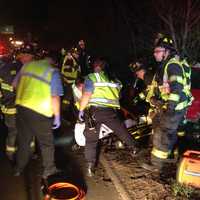 <p>Fairfield Fire Department at work at the scene of the fatal rollover on I-95. </p>