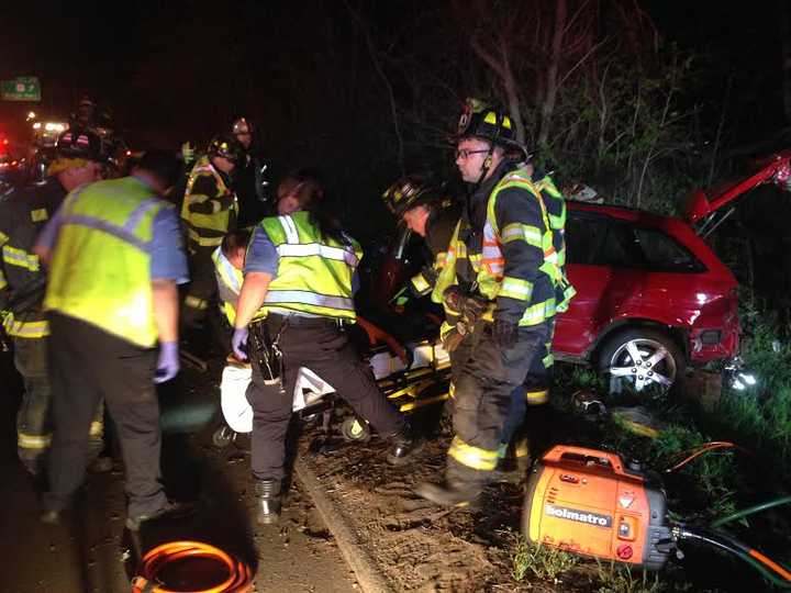 Fairfield Fire Department at work at the scene of the fatal rollover on I-95. 