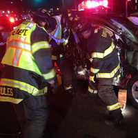 <p>Fairfield Fire Department at work at the accident scene on Black Rock Turnpike. </p>