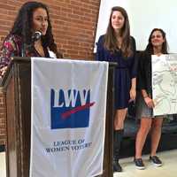 <p>A team of girls presents their political campign.</p>