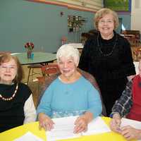 <p>Jean Harrison, 81, center, originally began painting fire hydrants in 1976 to celebrate the countrys bicentennial. </p>