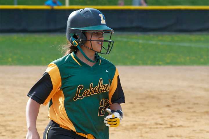 Lakeland&#x27;s Amber Badilla rounds the bases after smacking a grand slam.