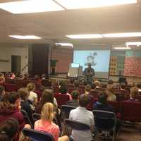 <p>Students at The Chapel School attended a presentation by author and illustrator Raúl Colón.</p>