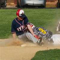 <p>Nick Schaefer of Byram Hills tags Michael Kakso out at second.</p>