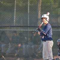 <p>Jon Lattarulo looks for signs from third base.</p>