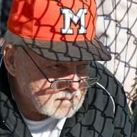 <p>Mamaroneck scorekeeper watches intently.</p>