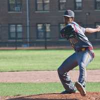 <p>Knights pitcher Victor Flack delivers a pitch.</p>