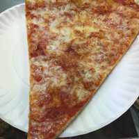 <p>A regular slice is the most popular order at Broadway North in Armonk.</p>