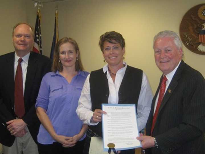 From left, Fairfield Selectmen Kevin Kiley and Sheila Marmion; Cheryll Houston, deputy director of the Southwest Regional Mental Health Board; and Fairfield First Selectman Mike Tetreau, honoring Mental Health Awareness Month.