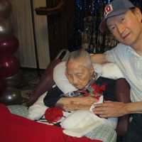 <p>George Feng with his 113-year-old mother, Kuo-Ying.</p>