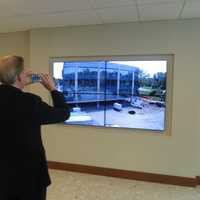 <p>A time-lapse video of the 14-month construction project was played on eight large screens throughout the new WESTMED building for patients and other visitors on Wednesday.</p>