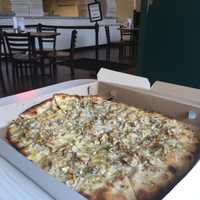 <p>The white clam pie is Frank Pepe&#x27;s specialty.</p>