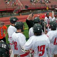 <p>The Foxes talk strategy during a timeout. </p>