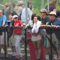 <p>Spectators watch the action on the visitors&#x27; side. </p>