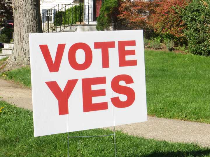 Three campaign workers have been indicted for election fraud.