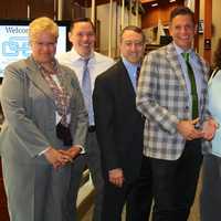 <p>Antony Stirpe, center, pictured with administrators and other staff from the New Rochelle Schools</p>