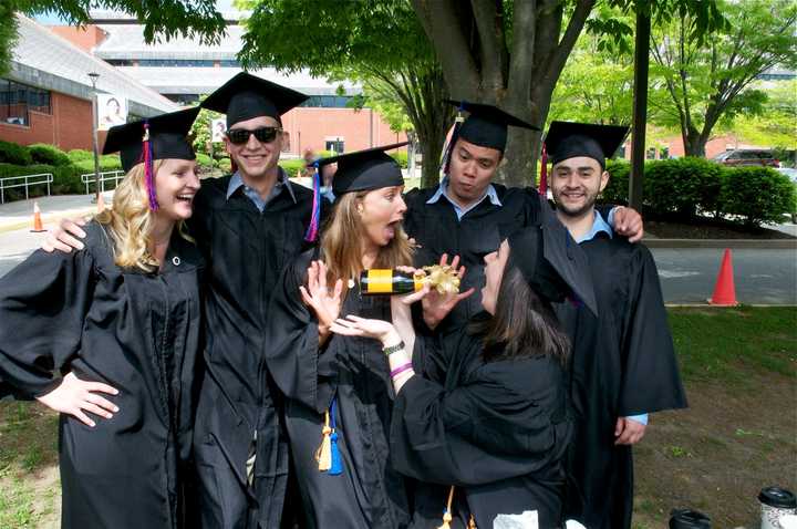 Students have fun just before Thursday&#x27;s graduation ceremonies at Norwalk Community College. 