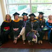 <p>Faculty and dignitaries gather at a pre-ceremony reception.</p>