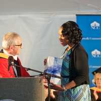 <p>Nicolas Donofrio presents the Distinguished Alumni Award to Rebecca Wilson.</p>