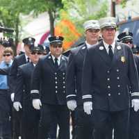 <p>Members of the Hastings-on-Hudson FD march in Sunday&#x27;s parade.</p>