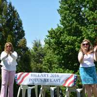 <p>A pro-Hillary presidential election banner is displayed along the parade route in Chappaqua.</p>