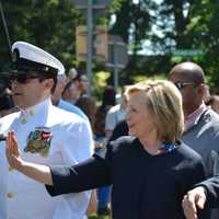 <p>Hillary Clinton waives while marching in New Castle&#x27;s Memorial Day parade in downtown Chappaqua.</p>