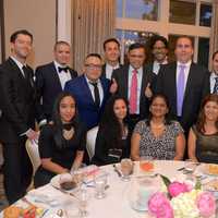 <p>Dr. Sumir Sahgal with friends, family, and the team at EssenMed, at the VNSW gala. </p>