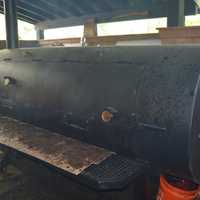 <p>The custom Lang Smoker is cooking away on the back porch at Hoodoo Brown BBQ in Ridgefield. </p>