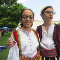 <p>Elisa and Denis Qehaja, sixth grade twins, were among the youths from Our Lady of Shkodra Church in Hartsdale preparing to dance at Kensico Dam Plaza before thunderstorms rolled in on Sunday.</p>