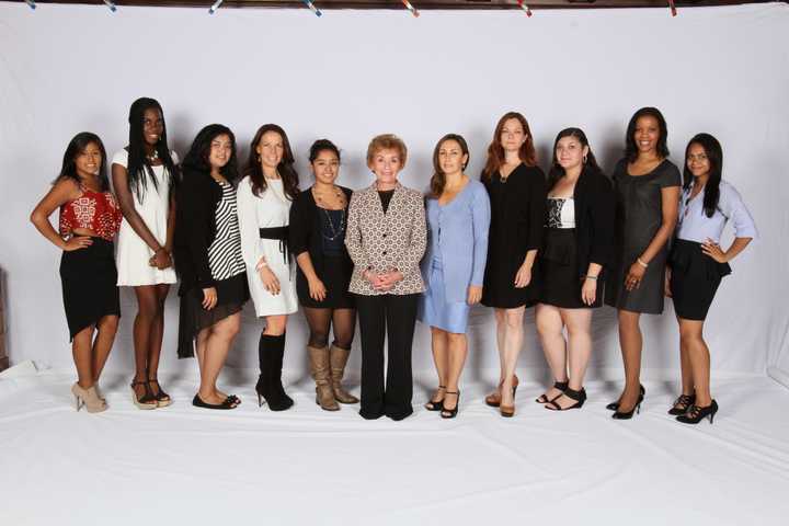 Judge Judy and a group of women from the Her Honor Mentoring Graduation on June 3.