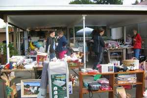 Coldwell Banker In Somers Hosts Garage Sale For Make-A-Wish