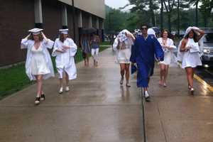 Rain Fails To Dampen Spirits At Wilton High's Graduation