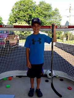Stamford Boy, 9, Turns To Triathlons To Help With Medical Issues