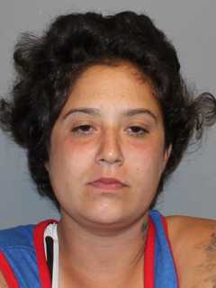 Norwalk Woman Charged With Setting Fires In Parking Lot
