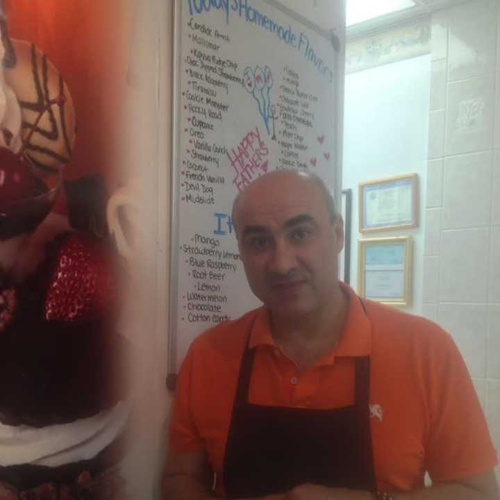 Owner and ice cream maker Tony Nascimento mans the counter at Il Bacio in Danbury. He is famous for his handcrafted frozen treats. 