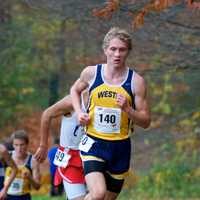 <p>David Stankiewicz runs in a race for Weston High School. The Syracuse University student died unexpectedly on Saturday.</p>