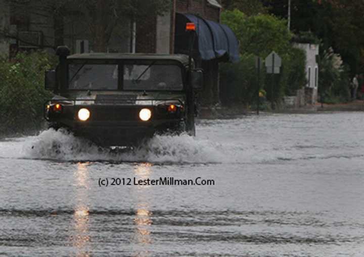 County Executive Ed Day signed a bond resolution authorizing $150,000 to purchase temporary flood barriers to protect local homes and property during storms. 